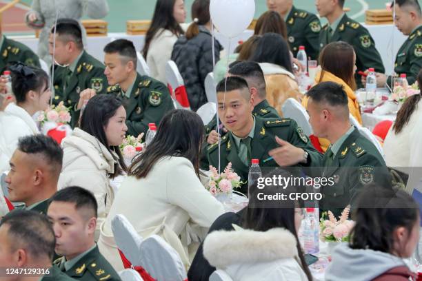 Chinese soldiers speed date with local youth in Yingtan city, Jiangxi province, China, February 14, 2023. The political work Department of a brigade...