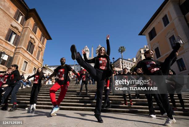 "One Billion Rising 2023" activists stage a flashmob protest on February 14, 2023 at the Spanish steps on Piazza di Spagna in Rome as part of...