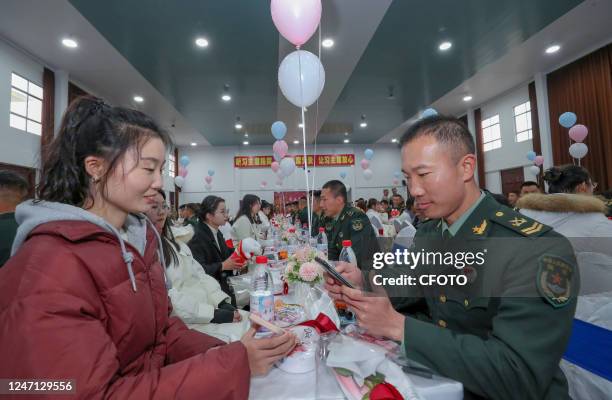 Chinese soldiers speed date with local youth in Yingtan city, Jiangxi province, China, February 14, 2023. The political work Department of a brigade...