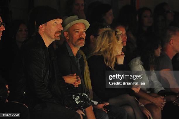 The Edge and Michael Stipe attend the Edun Spring 2012 fashion show during Mercedes-Benz Fashion Week at 330 West Street on September 11, 2011 in New...