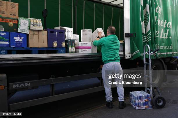 Worker unloads a truck in Soho, London, UK, on Tuesday, Feb. 14, 2023. UK wages rose quicker than expected at the end of 2022, heaping pressure on...