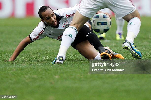 Diogo of Fluminense struggles for the ball with Liedson of Corinthians during a match as part of Serie A 2011 at Engenhao stadium on September 11,...