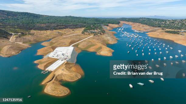 Oroville, CA Aerial photos of new concrete boat launch ramp at Loafer Point, left, and Bidwell Canyon Marina, right, at Lake Oroville which stands at...