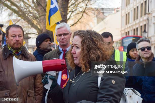 Fran Heathcote, president of PCS , speaks through a megaphone at the PCS picket outside The British Museum, as museum staff continue their strike...