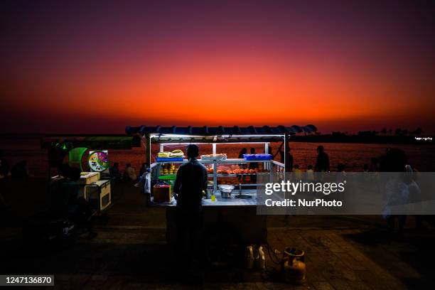 Street food vendor sells prawns, crabs, and rottie from his cart at Galle Face Promenade in Colombo, Sri Lanka, on February 14, 2023.