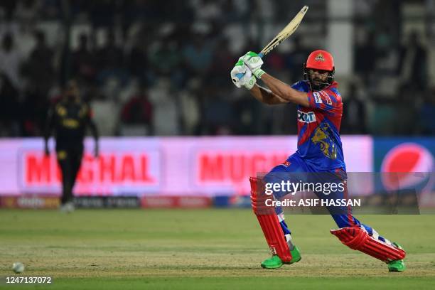 Karachi Kings' captain Imad Wasim plays a shot during the Pakistan Super League Twenty20 cricket match between Karachi Kings and Peshawar Zalmi at...