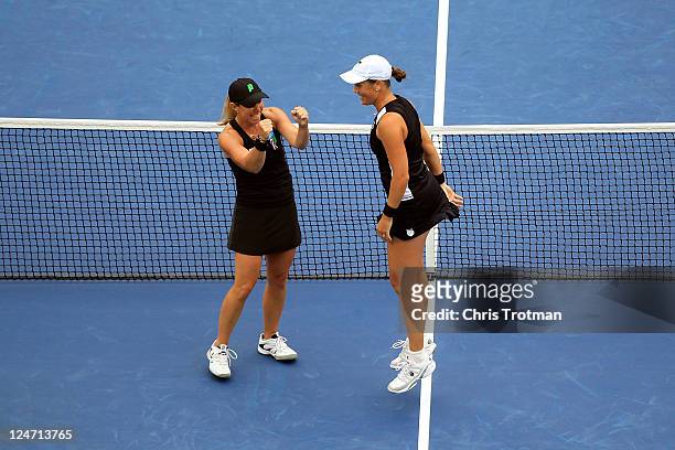 Liezel Huber and Lisa Raymond of the United States celebrate after defeating Vania King of the United States and Yaroslava Shvedova of Kazakhstan to...