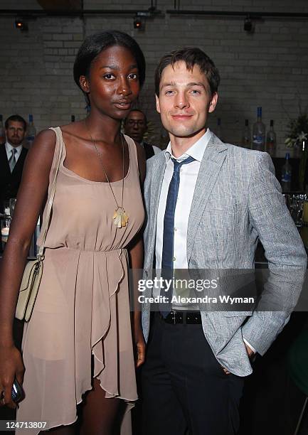 Actor Gregory Smith and guest attend "A Dangerous Method" party hosted by GREY GOOSE Vodka at Soho House Pop Up Club during the 2011 Toronto...