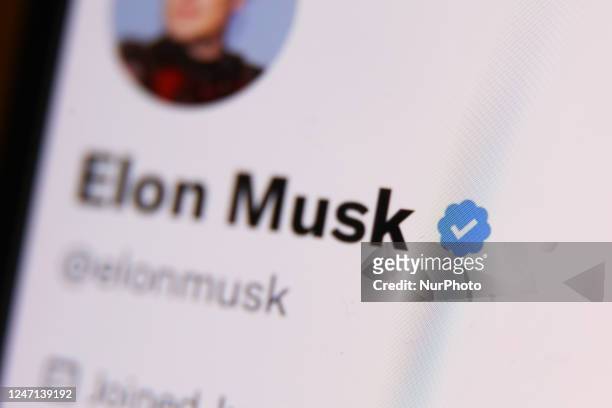 The blue checkmark on Elon Musk account on Twitter is seen displayed on a phone screen in this illustration photo taken in Krakow, Poland on February...