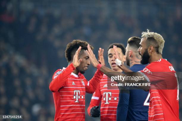 Bayern Munich's French forward Kingsley Coman celebrates scoring his team's first goal during first leg of the UEFA Champions League round of 16...