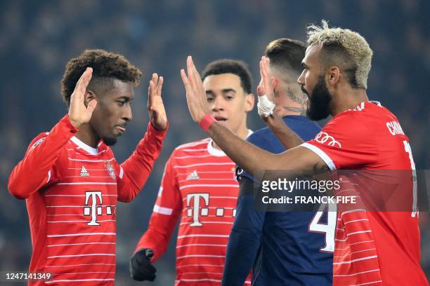Bayern Munich's French forward Kingsley Coman celebrates scoring his team's first goal during first leg of the UEFA Champions League round of 16...