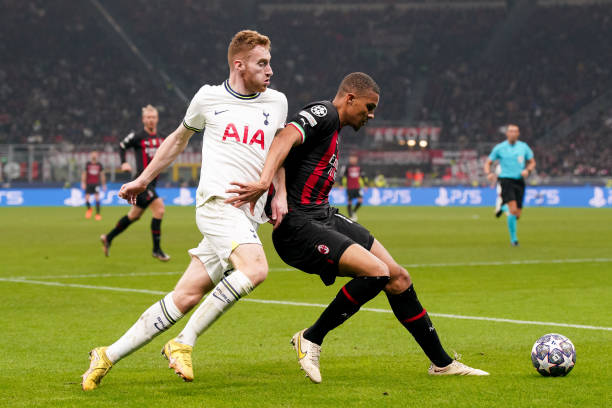 Malick Thiaw of AC Milan and Dejan Kulusevski of Tottenham Hotspur compete for the ball during the UEFA Champions League round of 16 leg one match...