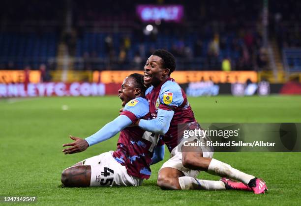 Michael Obafemi of Burnley and Nathan Tella of Burnley celebrate equalizer during the Sky Bet Championship match between Burnley and Watford at Turf...