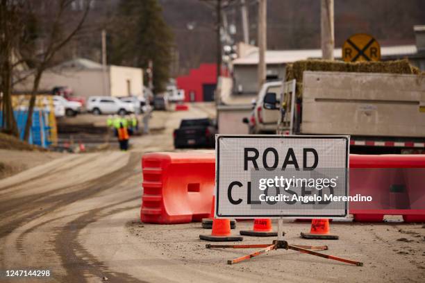 Road sign stops traffic near the site of a train derailment on February 14, 2023 in East Palestine, Ohio. A train operated by Norfolk Southern...