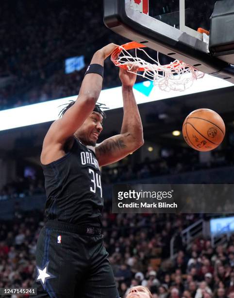 Wendell Carter Jr. #34 of the Orlando Magic goes up for a slam dunk against the Toronto Raptors during the first half of their basketball game at the...