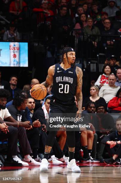 Markelle Fultz of the Orlando Magic dribbles the ball during the game against the Toronto Raptors on February 14, 2023 at the Scotiabank Arena in...