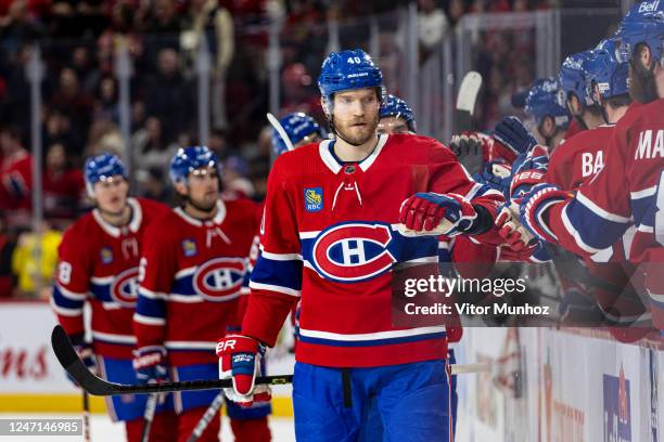 The Montreal Canadiens celebrates a goal with Joel Armia during the third period of the NHL regular season game between the Montreal Canadiens and...