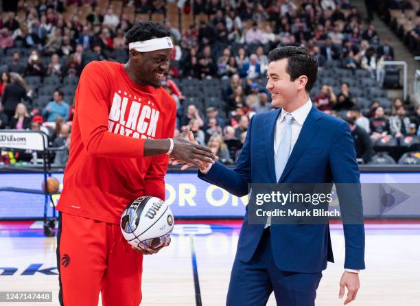 Toronto Raptors General Manager Bobby Webster takes part in a congratulatory ceremony for Pascal Siakam of the Toronto Raptors for making the...