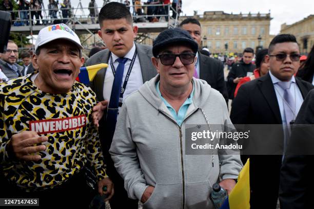 Rodrigo Londono, former FARC-EP guerrilla, known by his alias Timochenko, now a member of the political party Comunes, walks with of supporters of...