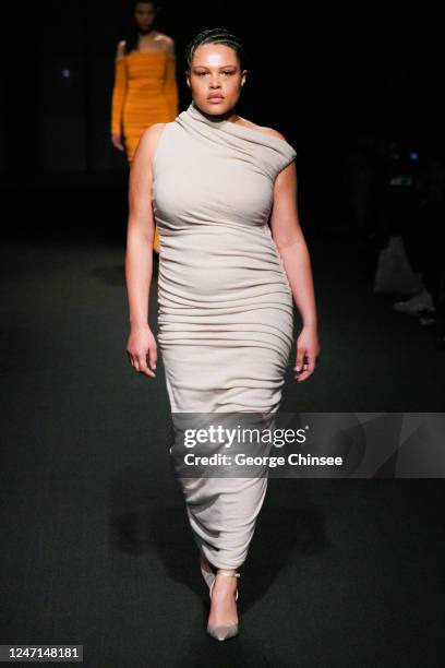 Model on the runway at Altuzarra Fall 2023 Ready To Wear Fashion Show at the New York Public Library on February 14, 2023 in New York, New York.