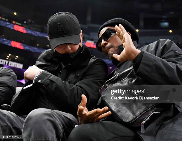 Leonardo DiCaprio and rapper Q-Tip attend a basketball game between the Los Angeles Clippers and the Golden State Warriorsat Crypto.com Arena on...