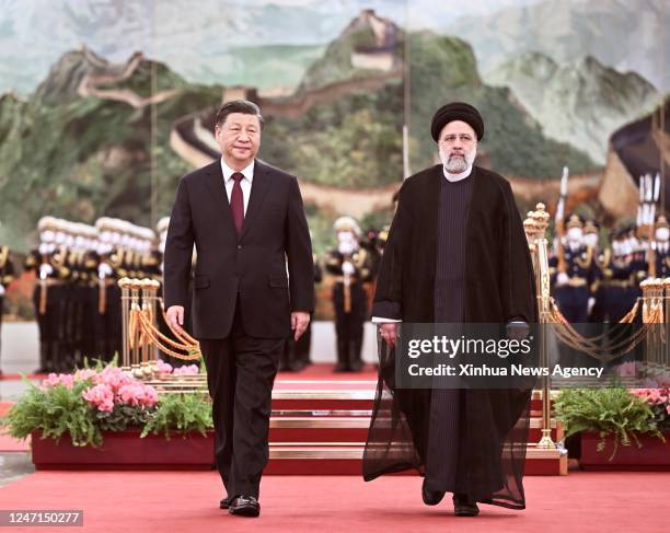 Chinese President Xi Jinping holds a welcoming ceremony for visiting President of the Islamic Republic of Iran Ebrahim Raisi prior to their talks at...