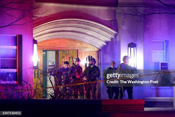 East Lancing, Michigan Members of a SWAT team exit Berkey Hall on the campus of Michigan State University after responding to the scene of a shooting...