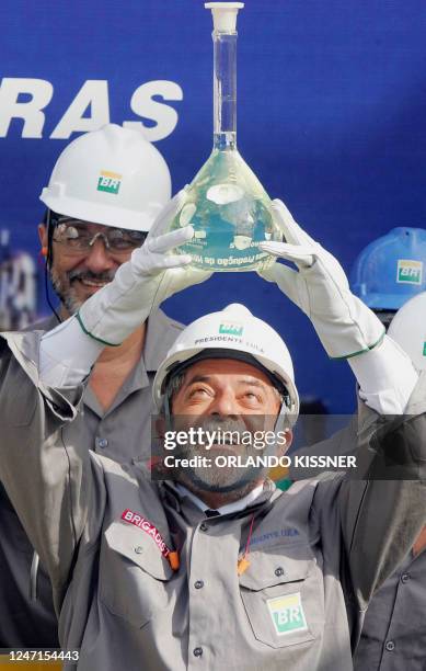 Brazilian president Luiz Inacio Lula da Silva holds an H-BIO sample during an industrial production test at the President Getulio Vargas refinery...