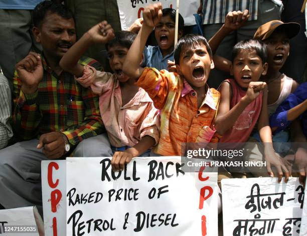 Communist Party of India activists shout slogans against the central government against the petrol and diesel price hike during a protest in New...