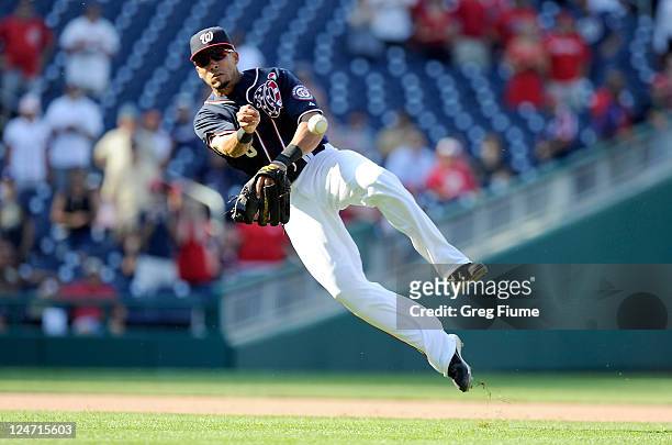 Ian Desmond of the Washington Nationals throws the ball to first base for the final out in a 8-2 victory against the Houston Astros at Nationals Park...