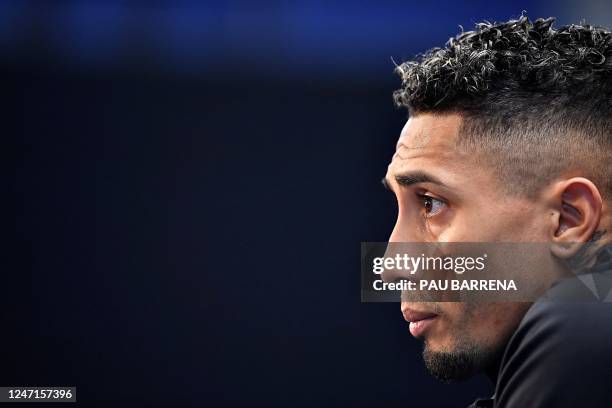 Barcelona's Brazilian forward Raphael Dias Belloli, aka Raphinha looks on during a press conference on the eve of their UEFA Europa League play-offs...