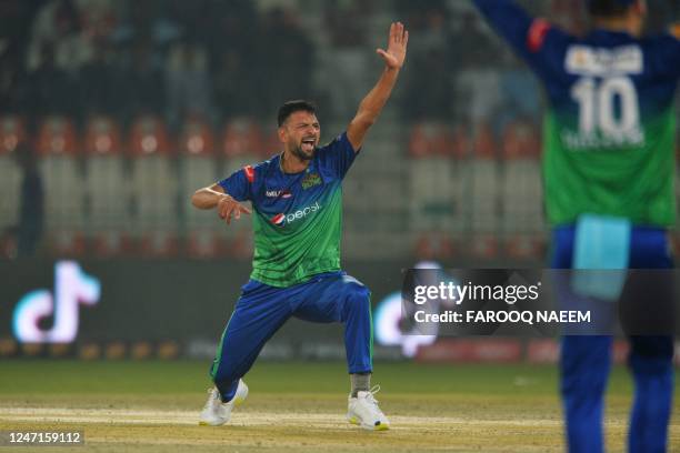 Multan Sultans' Ihsanullal celebrate the wicket of Quetta Gladiators' Iftikhar Ahmed during the Pakistan Super League Twenty20 cricket match between...