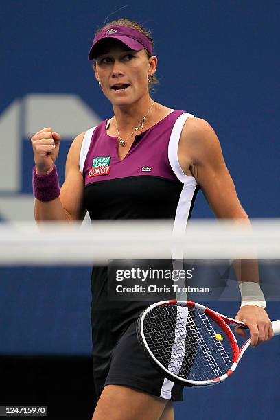Samantha Stosur of Australia reacts after winning the first set against Serena Williams of the United States during the Women's Singles Final on Day...