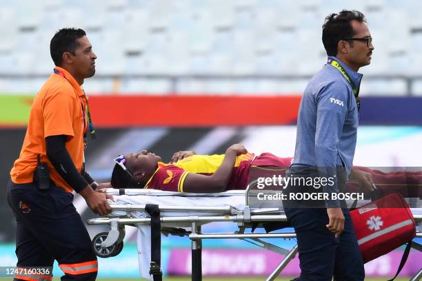 West Indies' Stafanie Taylor is taken off the field on a gurney by medical personnel during the Group B T20 women's World Cup cricket match between...