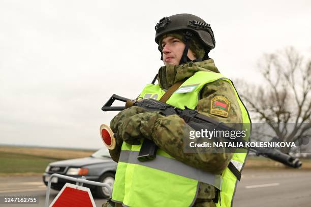 Belarusian border guards check drivers and vehicles entering the border zone near the frontier with Ukraine near the settlement of Divin in the Brest...
