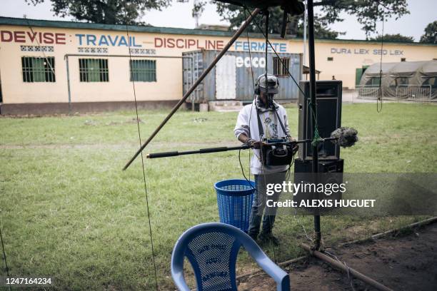 Sound engineer shooting a documentary for an Italian television crew records a court hearing for the murder of former Italian ambassador to the...