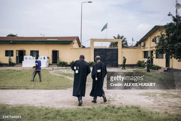 Lawyers are seen in the courtyard after the court hearing for the murder of former Italian ambassador to the Democratic Republic of Congo Luca...