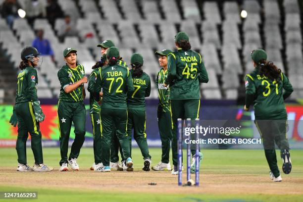 Pakistan players celebrate after the dismissal of Ireland's Eimear Richardson during the Group B T20 women's World Cup cricket match between Pakistan...