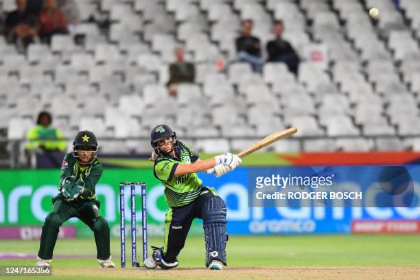 Ireland's Eimear Richardson plays a shot as Pakistan's wicketkeeper Muneeba Ali reacts during the Group B T20 women's World Cup cricket match between...