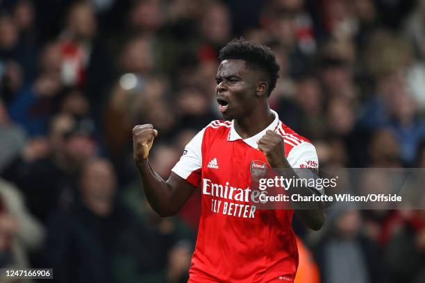 Bukayo Saka of Arsenal celebrates their first goal during the Premier League match between Arsenal FC and Manchester City at Emirates Stadium on...