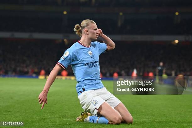Manchester City's Norwegian striker Erling Haaland celebrates after scoring his team third goal during the English Premier League football match...