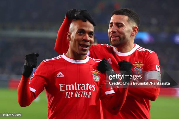 Joao Mario of Benfica celebrates scoring a goal to make the score 0-1 with Nicolas Otamendi during the UEFA Champions League round of 16 leg one...