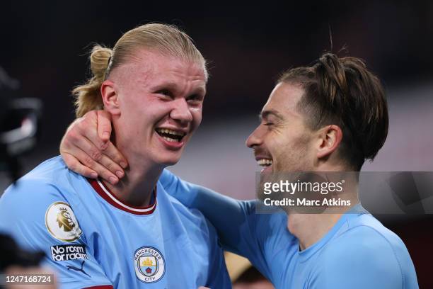 Erling Haaland of Manchester City celebrates the win with Ruben Dias during the Premier League match between Arsenal FC and Manchester City at...