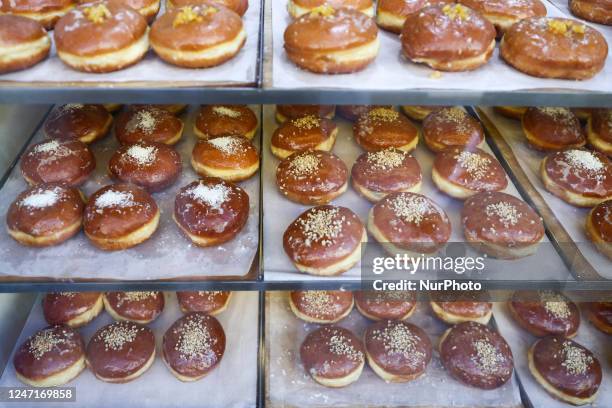 Bakery sales donuts a day ahead of Fat Thursday. Krakow, Poland on February 16, 2023. Fat Thursday is a traditional Catholic Christian feast on the...