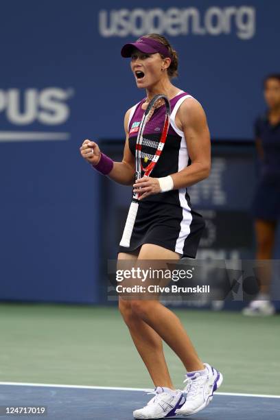 Samantha Stosur of Australia reacts while playing against Serena Williams of the United States during the Women's Singles Final on Day Fourteen of...