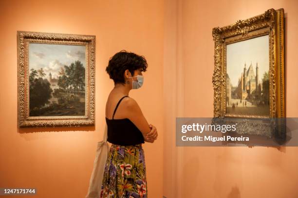 Woman wearing a face mask enjoys one of the exhibition rooms at Thyssen-Bornemisza National Museum on June 6 in Madrid, Spain. Today, the museum...