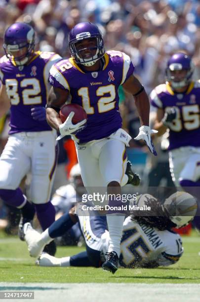 Percy Harvin of the Minnesota Vikings runs back the openig kick for a touchdown during their season opener against the San Diego Chargers on...