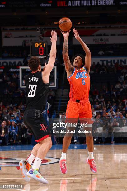 Jaylin Williams of the Oklahoma City Thunder shoots a three point basket against the Houston Rockets on February 15, 2023 at Paycom Arena in Oklahoma...