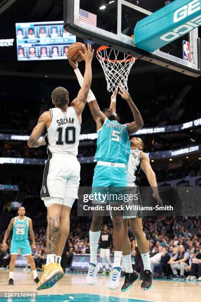 Mark Williams of the Charlotte Hornets drives to the basket during the game against the San Antonio Spurs on February 15, 2023 at Spectrum Center in...