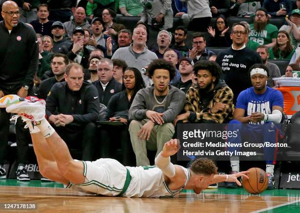 February 15: Blake Griffin of the Boston Celtics dives for a loose ball during the second half of the NBA game against the Detroit Pistons at the TD...